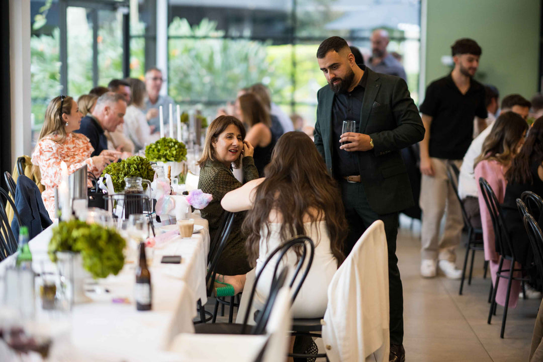 Event patrons enjoying a christening events